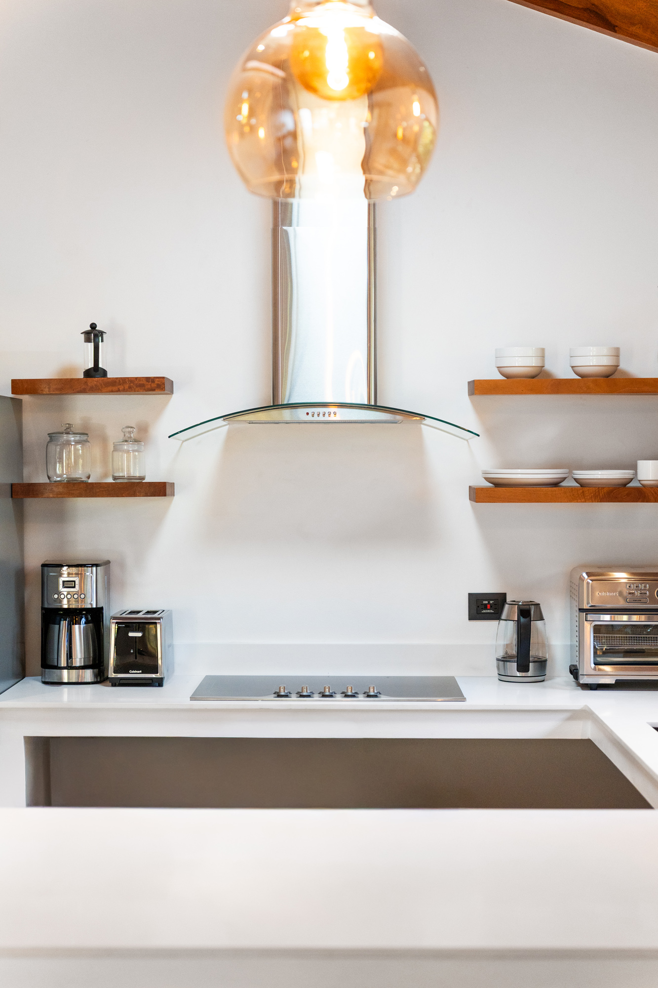 Kitchen stovetop with pendant light